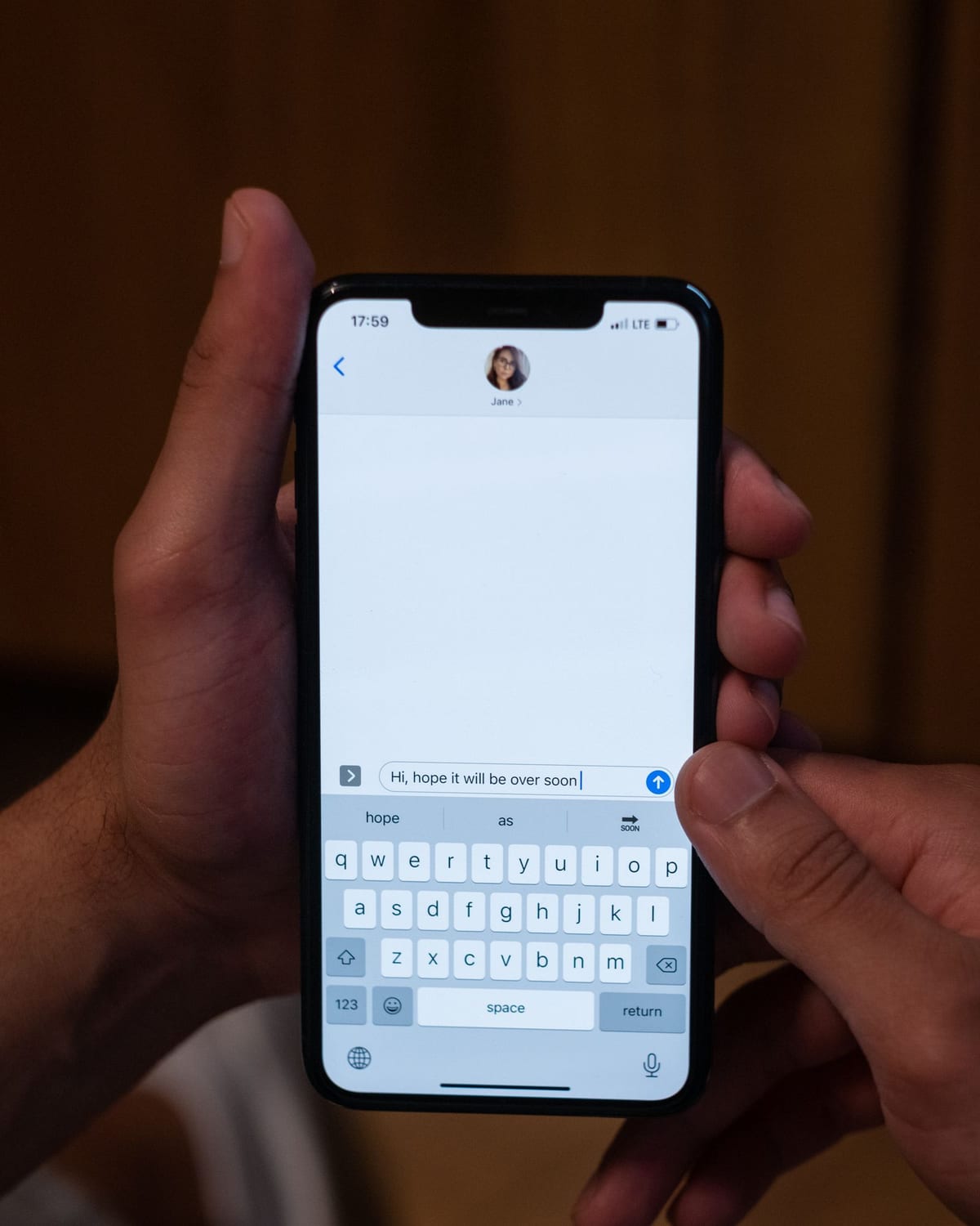 A guest reading a SoftInvites e-invitation on their phone